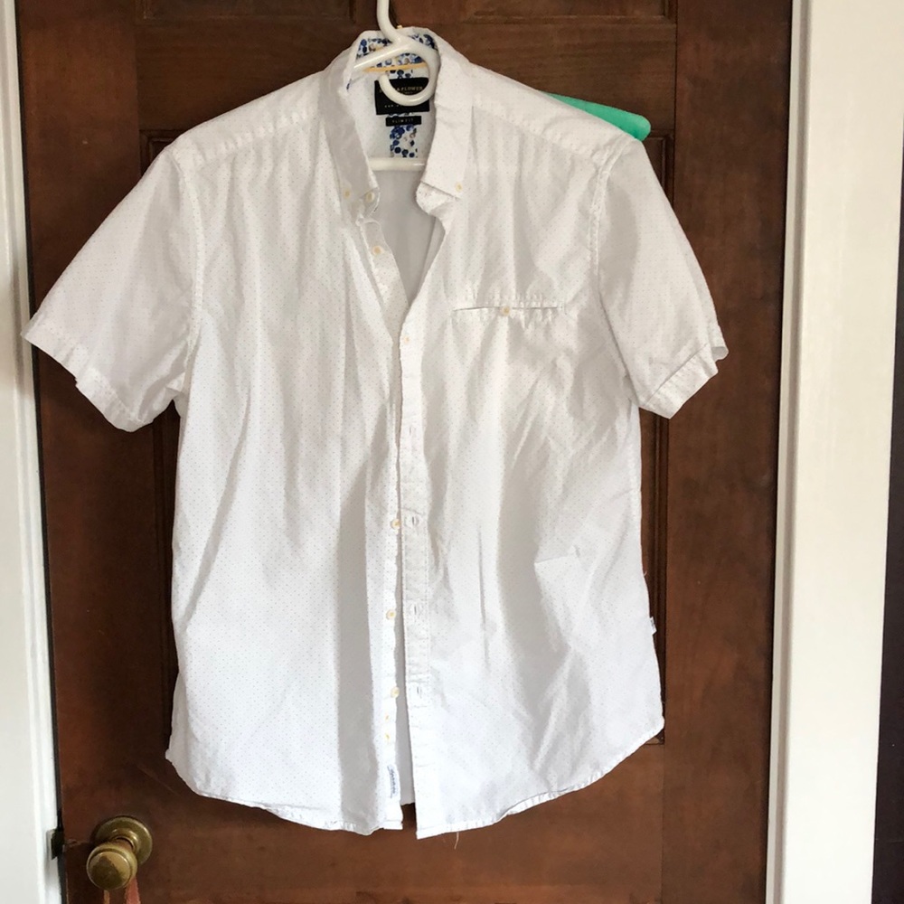 Shortsleeve white polka dot button down shirt